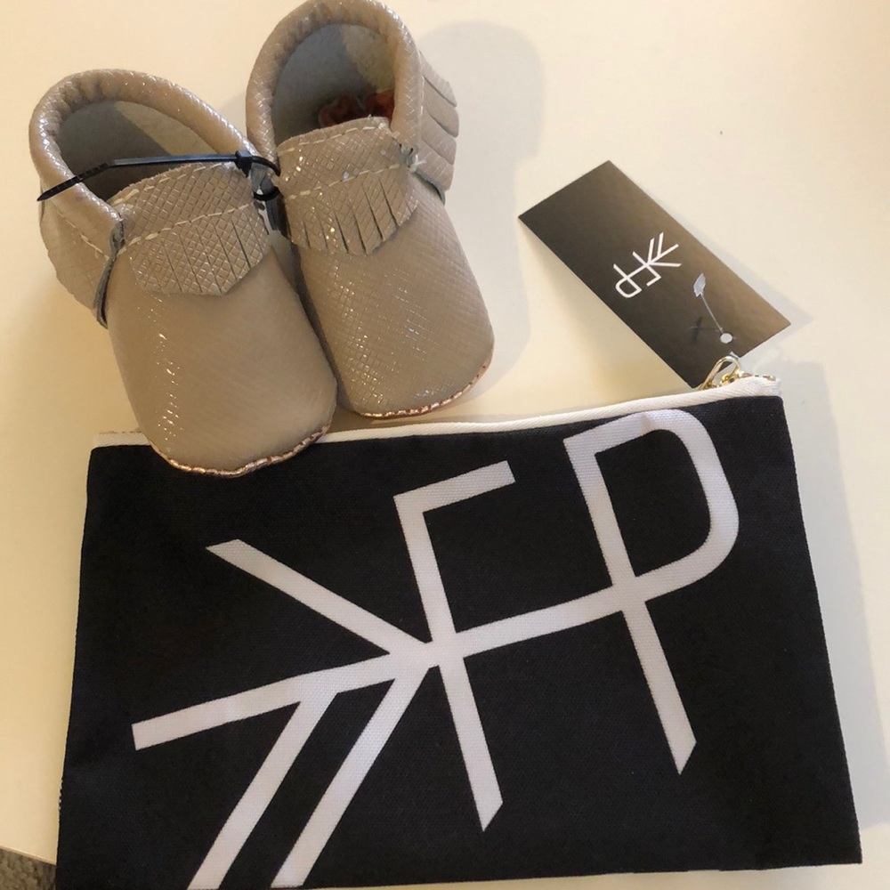 Brand new Freshly Picked Mocs with zippered bag.